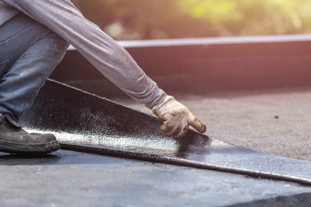 Professional Basement Waterproofing technician working in Palmyra, IN